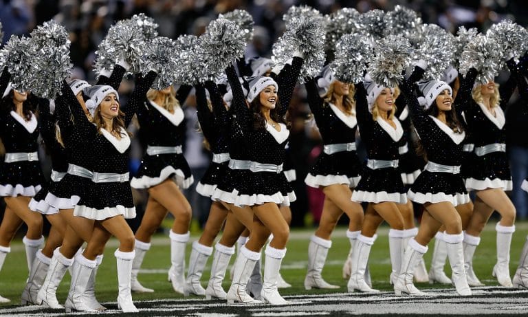 Guard Busted For Playing Pocket Pool While Watching NFL Cheerleaders