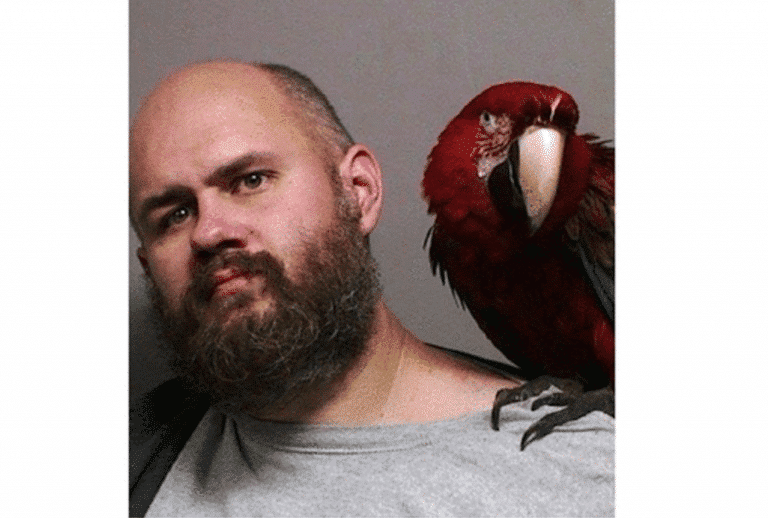 Friendly Sheriff’s Office Lets Man Pose With Pet Bird During Mug Shot