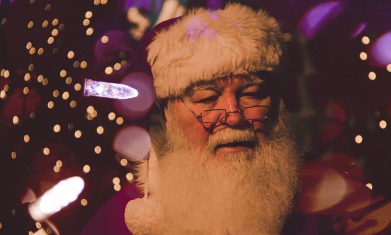 Father Christmas Hands Out Dick-Shaped Bracelets To Children