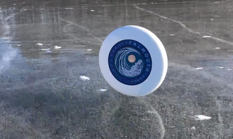 This Video Of A Frisbee Rolling Across An Ice Pond Is Mesmerizing