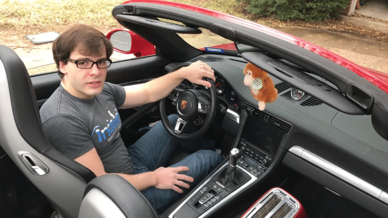 Is This Video Of A Guy Playing ‘Doom’ While Driving A Porsche Real?