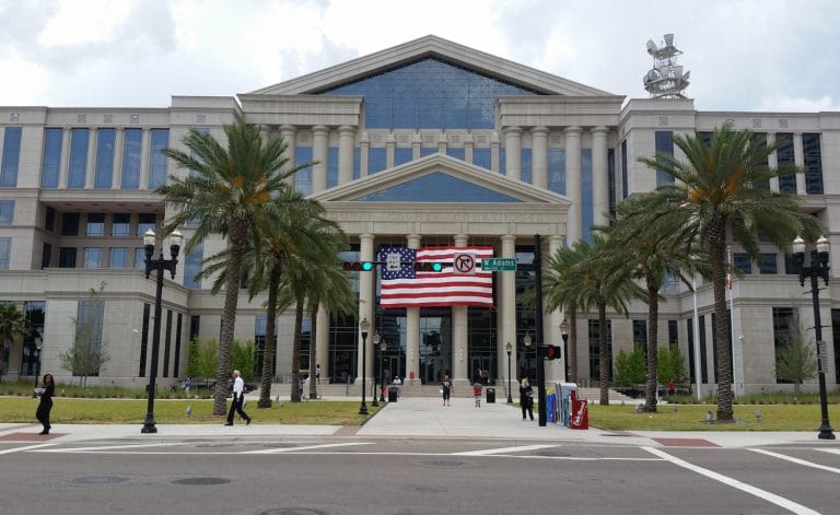 Woman Filmed Herself Performing Oral Sex on Mystery Man in Florida Courthouse