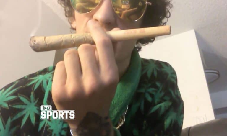 Watch: Snoop Dogg Shares Victory Blunt With Young UFC Champ