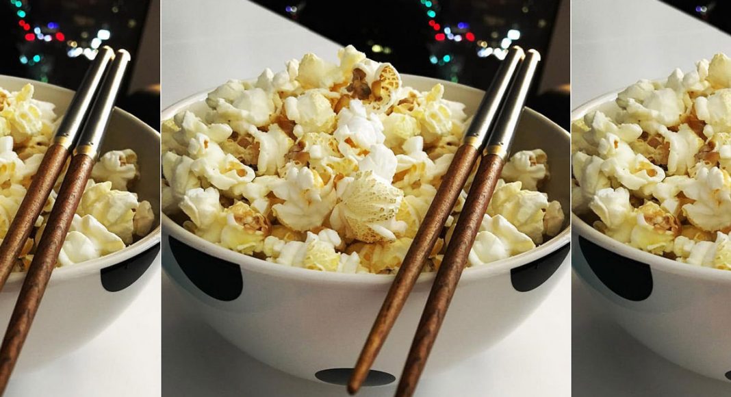 Why You Should Eat Popcorn With Chopsticks