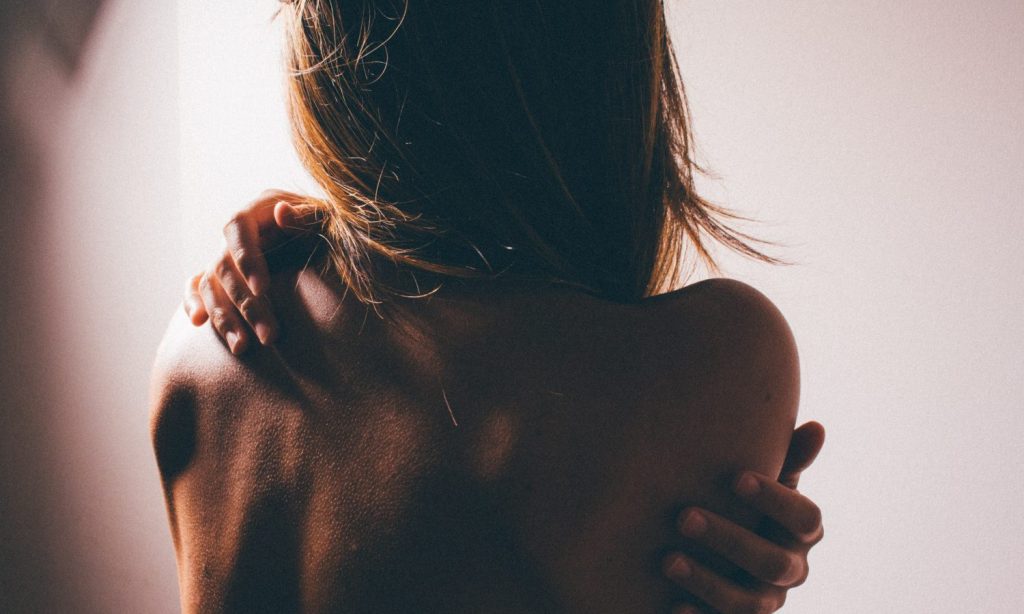 close photo of woman's back