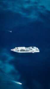 white and black ship on sea during daytime